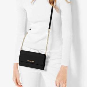 西集網(wǎng)：Michael Kors Jet Set Travel 女士真皮鏈條單肩包32T4GTVC3L 兩色 官網(wǎng)￥2400 